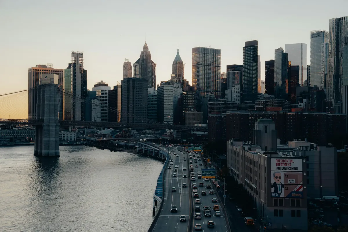 New York City skyline with bridge and highway traffic