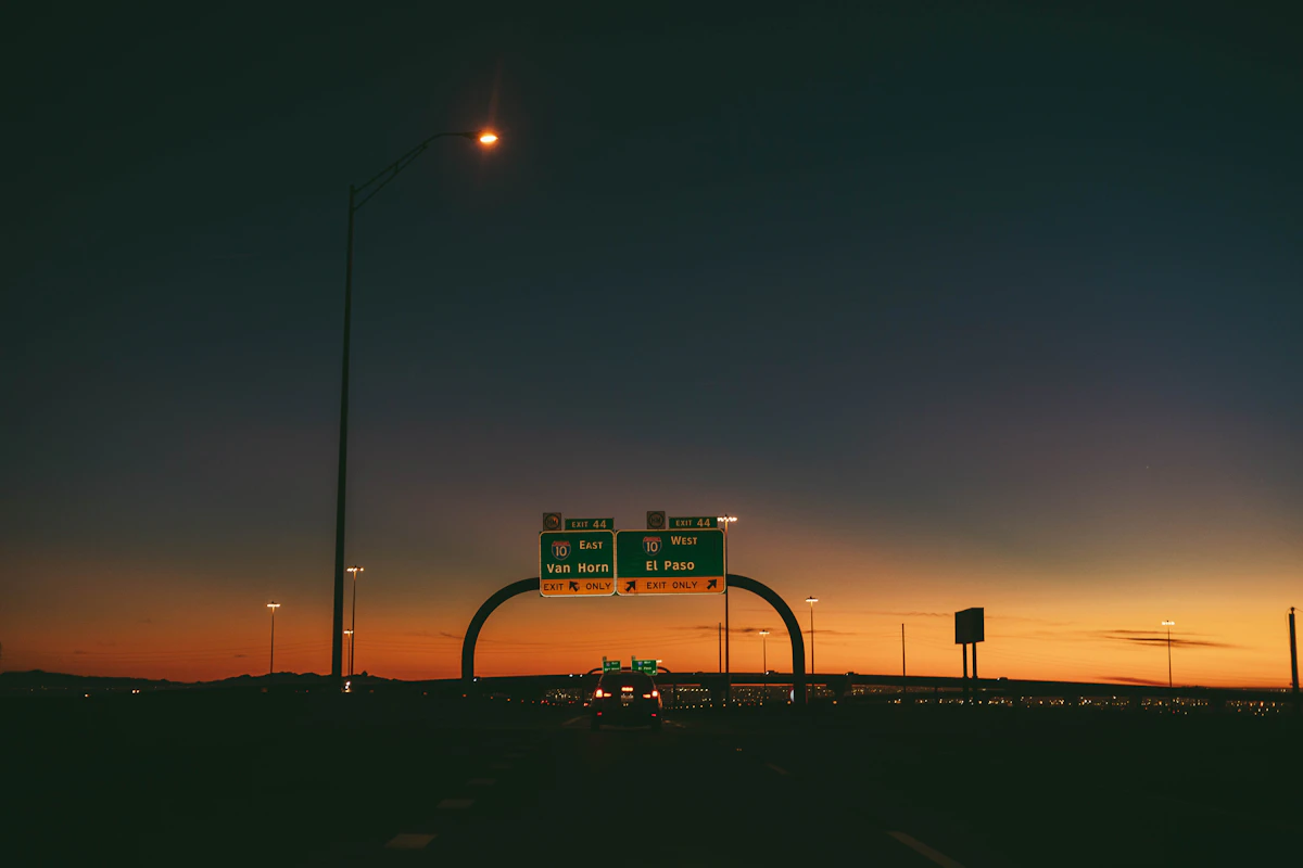Highway sign at dusk