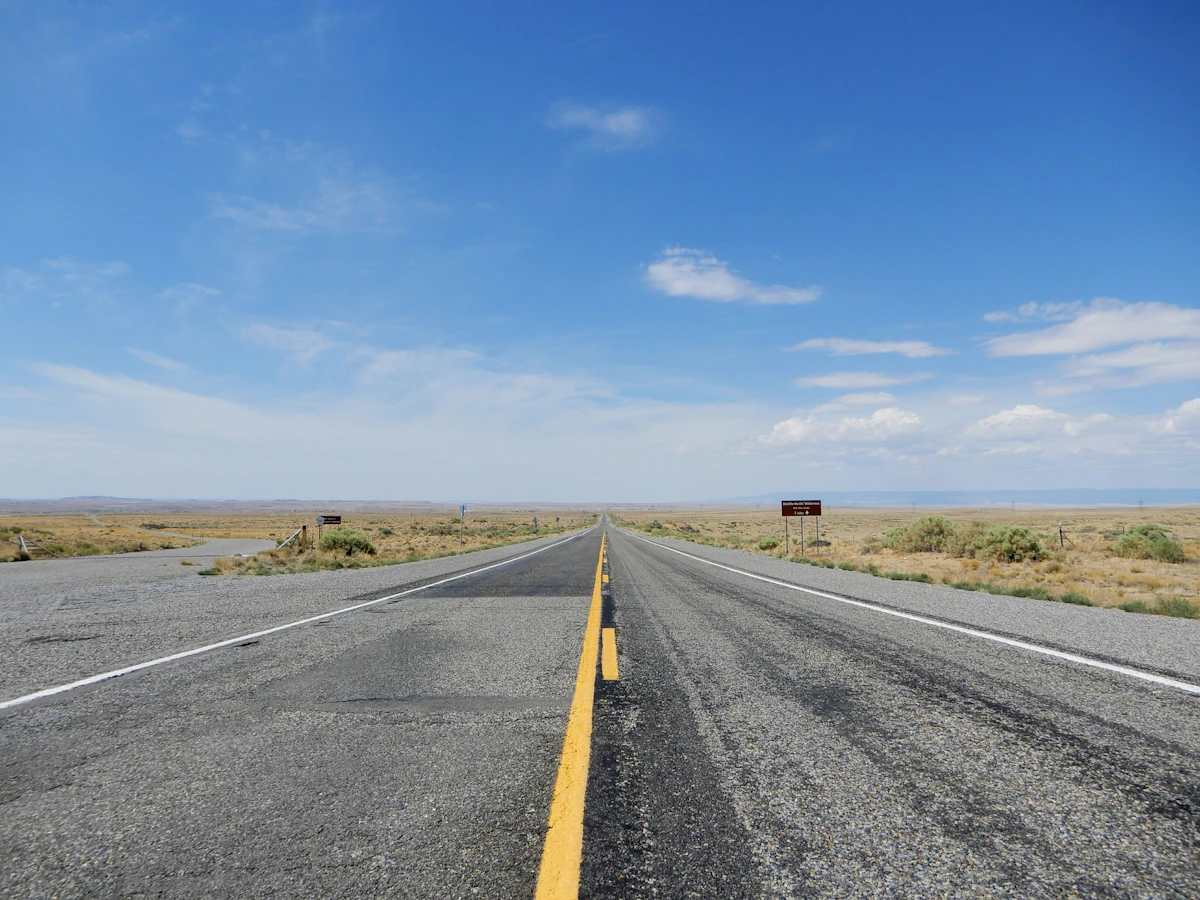 Straight highway under a blue sky